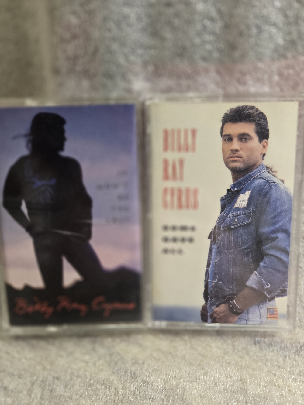 two vintage cassette tape copies of Billy Ray Cyrus's 1992 debut studio album, S